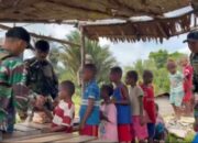 Satgas Yonif 763/SBA Berbagi Keceriaan Bersama Anak-Anak di Kampung Bori
